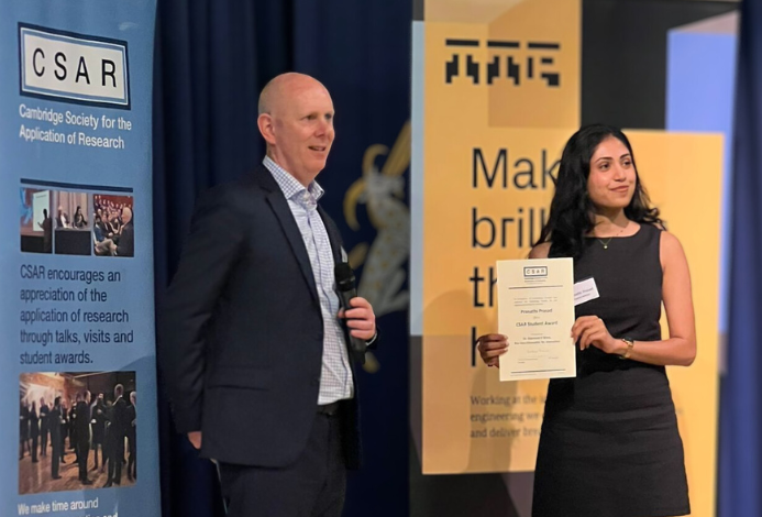 Pranathi receiving her award from Dr Diarmuid O’Brien, Pro-Vice-Chancellor for Innovation at the University of Cambridge. Pranathi Prasad receiving her award